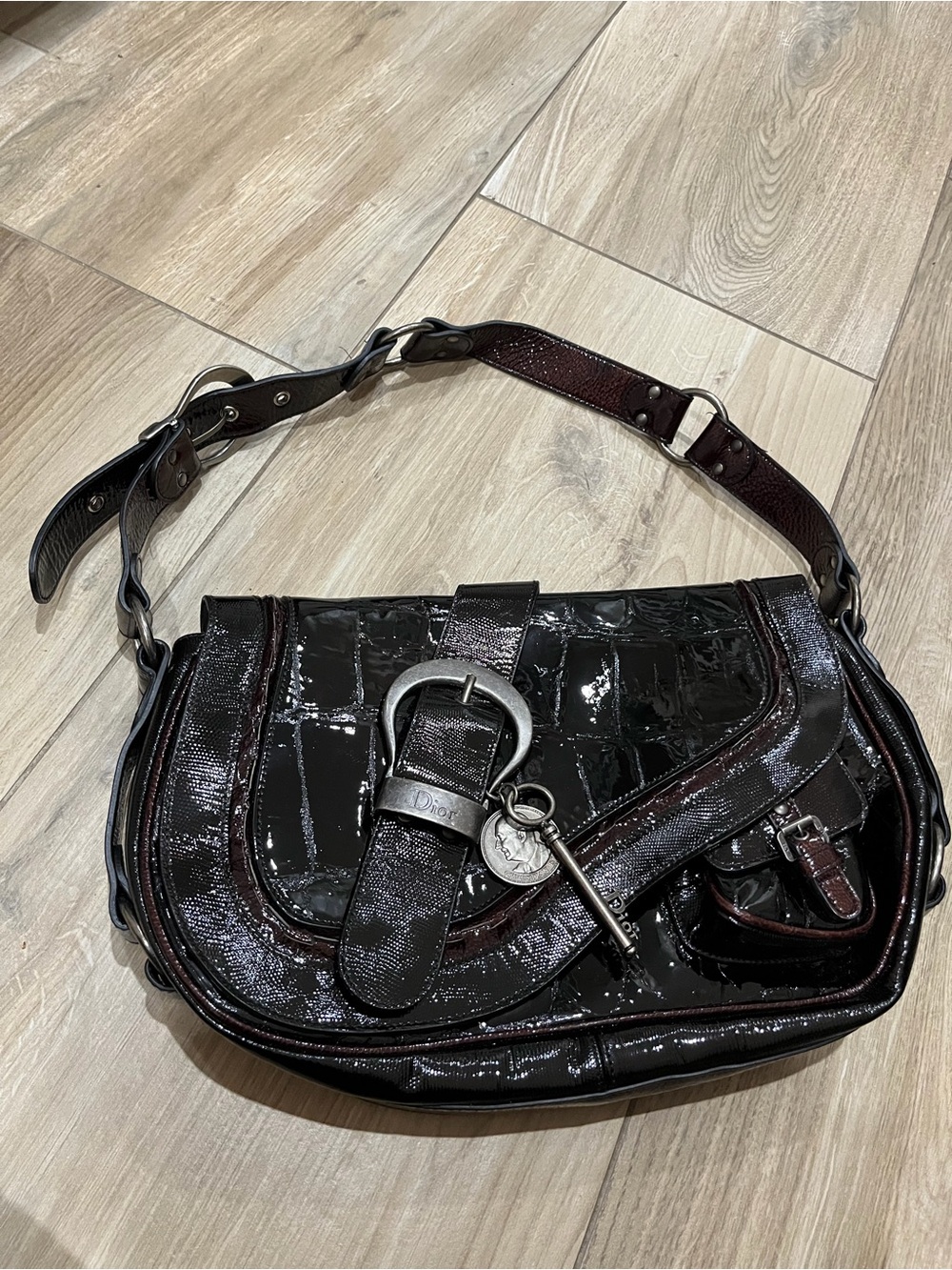 Authentic Dior - Like New - Patent Leather Gaucho Saddle Bag with Key Charm